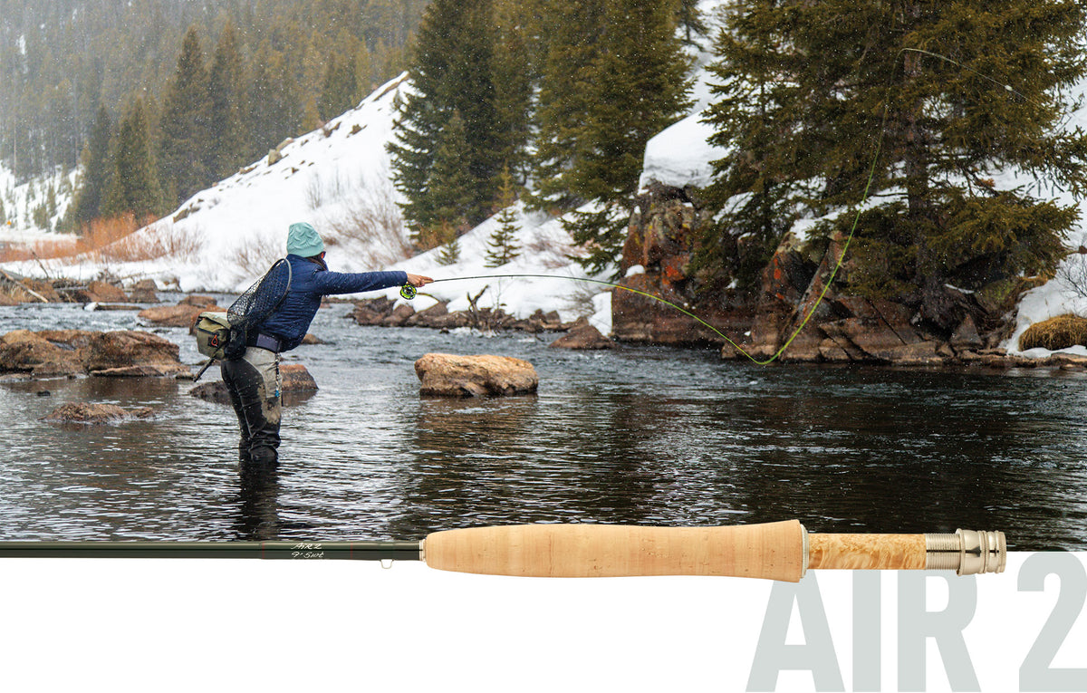 R.L. Winston Air 2 Fly Rod shown with angler casting on snowy mountain river at Freestone Fly Shop
