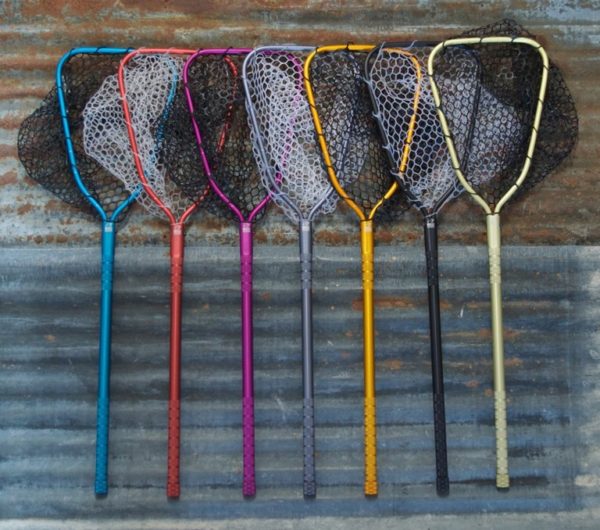 Rising 24" Brookie XL - Red fishing net by Rising displayed among multicolored nets at Freestone Fly Shop