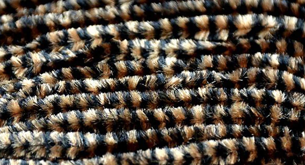 Varigated Chenille by Hareline Dubbin, Inc with alternating natural tones for detailed fly tying at Freestone Fly Shop