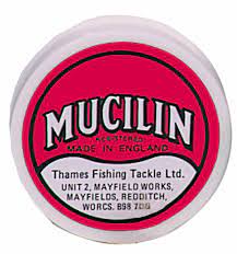 Mucilin fishing fly tying wax in round container for secure fly tying at Freestone Fly Shop