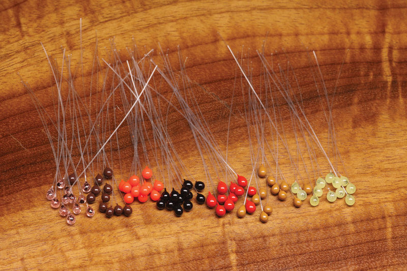 Epoxy Mono Crab Eyes by Hareline Dubbin Inc with varied colors for realistic crab and shrimp fly tying at Freestone Fly Shop
