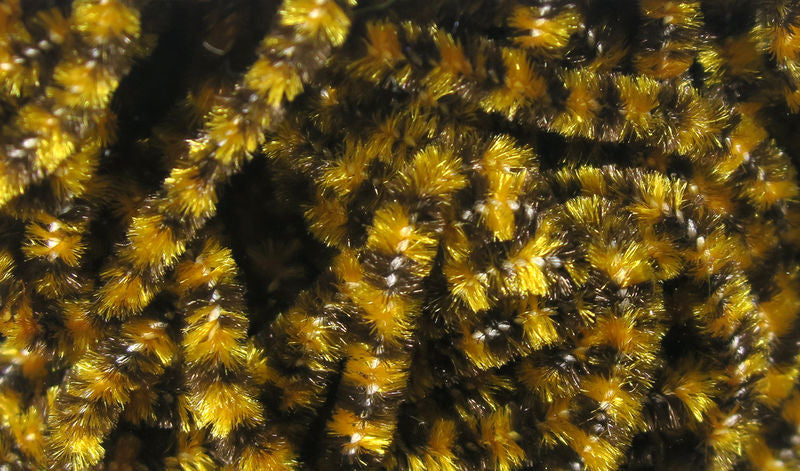 Small Varigated Chenille by Hareline Dubbin, Inc with golden and black fibers for detailed fly tying at Freestone Fly Shop