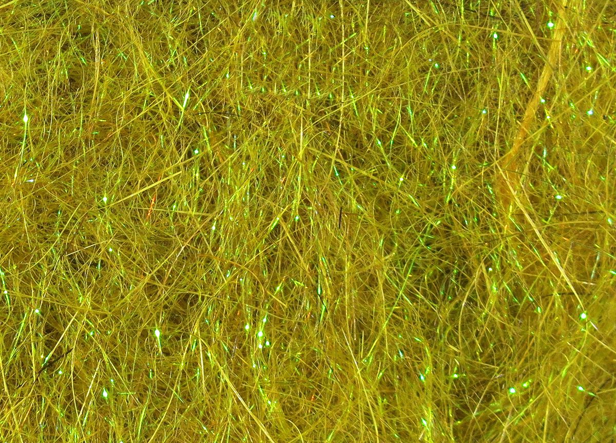 Hare's Ice Dub fibers in golden olive shade with reflective strands for fly tying at Freestone Fly Shop