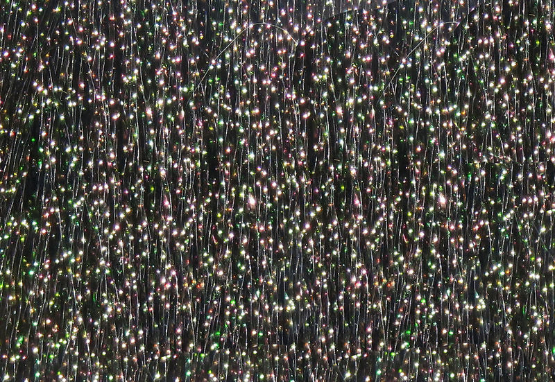 Krystal Flash strands with iridescent sparkle by Hareline Dubbin, Inc for fly tying at Freestone Fly Shop
