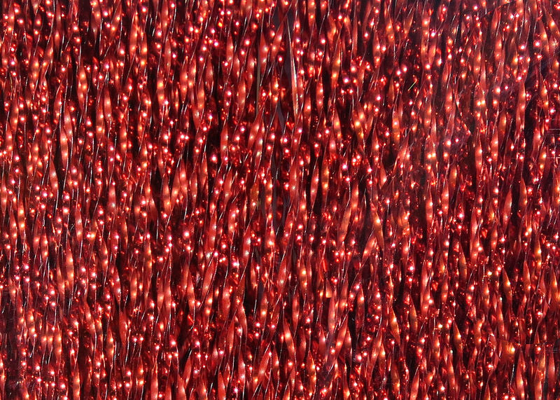 Krystal Flash strands in deep ruby red with glistening accents by Hareline Dubbin, Inc for fly tying at Freestone Fly Shop