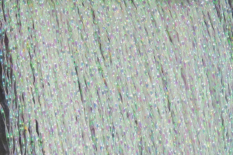 Krystal Flash in translucent strands with subtle iridescent sheen by Hareline Dubbin, Inc for fly tying at Freestone Fly Shop
