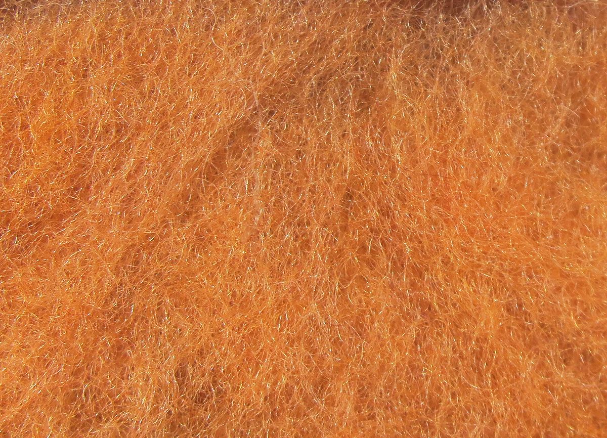 Micro Fine Dry Fly Dub fibers in warm orange tones by Hareline Dubbin, Inc for expert fly tying at Freestone Fly Shop