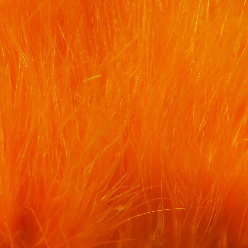 Wooly Bugger Marabou fibers in vibrant orange by Hareline Dubbin Inc for fly tying at Freestone Fly Shop