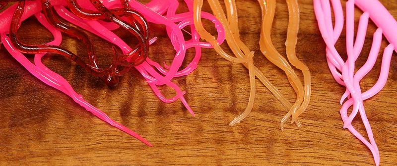 Mini Squiggle Worms by Hareline Dubbin Inc in various colors for fly fishing at Freestone Fly Shop