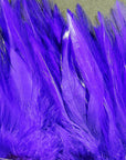 Strung Chinese 5-7 inch Saddle by Hareline Dubbin, Inc in vibrant purple for fly tying at Freestone Fly Shop