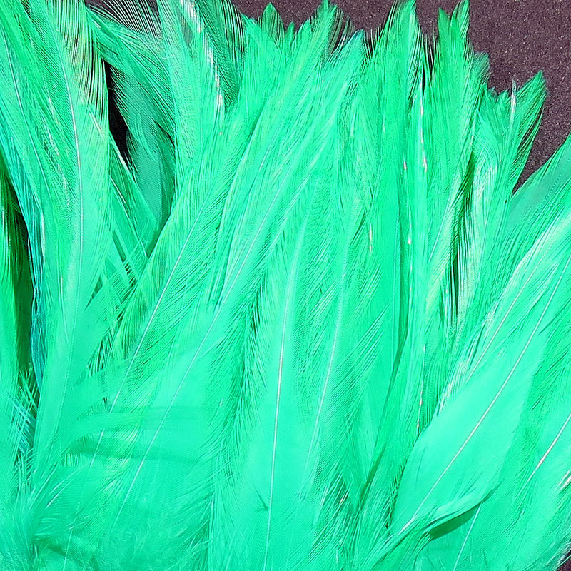 Strung Chinese 5-7 inch Saddle by Hareline Dubbin, Inc in bright green for versatile fly tying at Freestone Fly Shop
