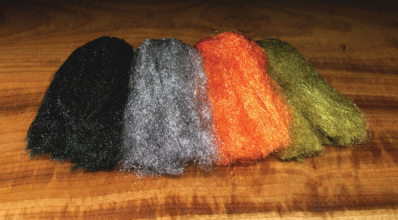 Sparkle Emerger Yarn by Hareline Dubbin, Inc with crinkly trilobal fiber in black, silver, orange, and olive for fly tying at Freestone Fly Shop