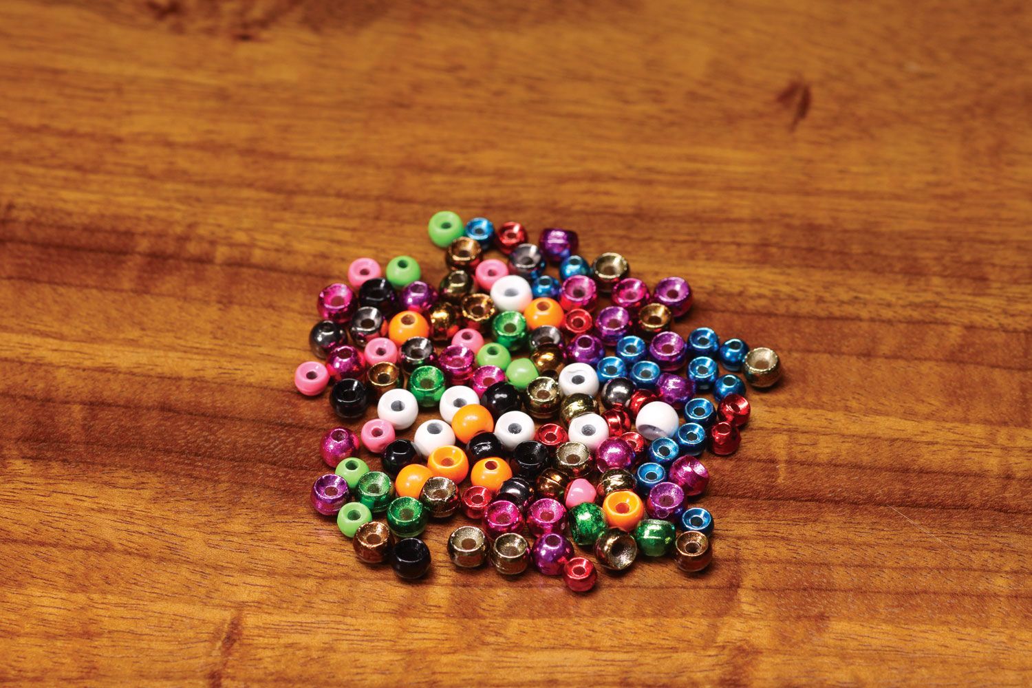 Plummeting Tungsten Bead assortment in bright colors by Hareline Dubbin, Inc for fly tying at Freestone Fly Shop