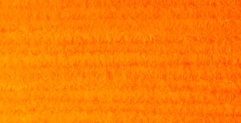 Ultra Chenille in bold orange with velvety feel and nylon core by Hareline Dubbin, Inc for fly tying at Freestone Fly Shop