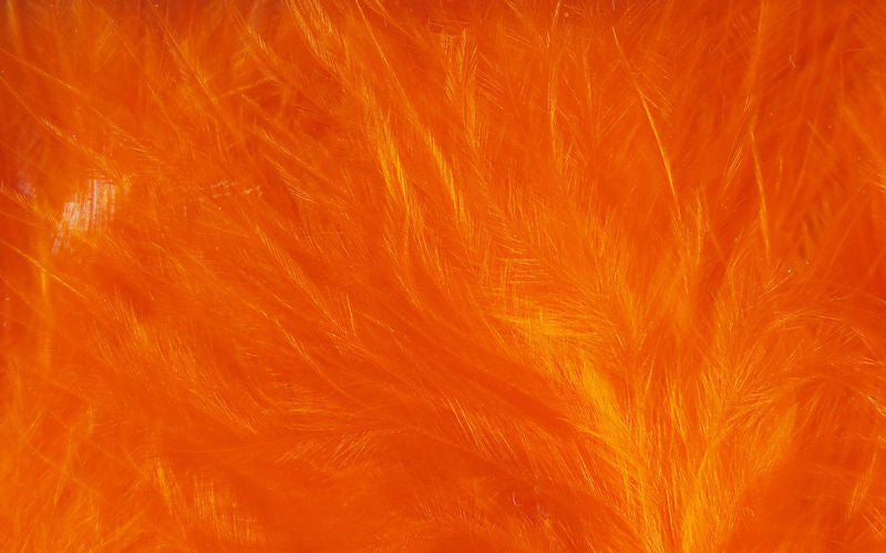 Wooly Bugger Marabou fibers in bright vibrant orange by Hareline Dubbin, Inc for fly tying at Freestone Fly Shop